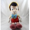 Peluche Pinocchio DISNEY STORE écusson petit garçon pantin de bois 44 cm