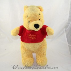 Peluche Winnie l'ourson DISNEY NICOTOY jaune t-shirt Winnie The Pooh rouge 30 cm