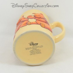Mug en relief Winnie l'ourson DISNEY STORE différentes expressions tasse céramique orange 3D