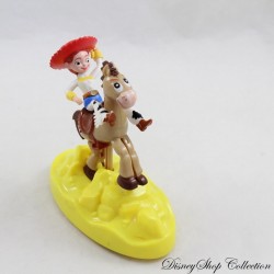 Figur Jessie DISNEY PIXAR Toy Story auf dem Pferd Pil Haar gelber Sockel 10 cm