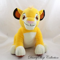 León de peluche Simba DISNEY El Rey León ojos bordados naranjas sentados 30 cm