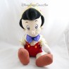 Peluche Pinocchio DISNEYLAND PARIS petit garçon