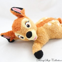 Peluche Bambi DISNEY NICOTOY biche marron allongé sur le ventre poils bouclés 30 cm