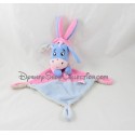 Doudou plana burro campana Eeyore NICOTOY disfrazado de conejo rosa y azul 29 cm