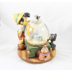Snowglobe musical Pinocchio DISNEY STORE Toyland bocal poisson Cleo Figaro et Jiminy