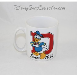 Mug Donald DISNEYLAND PARIS tasse céramique lettre D since 1934 Disney